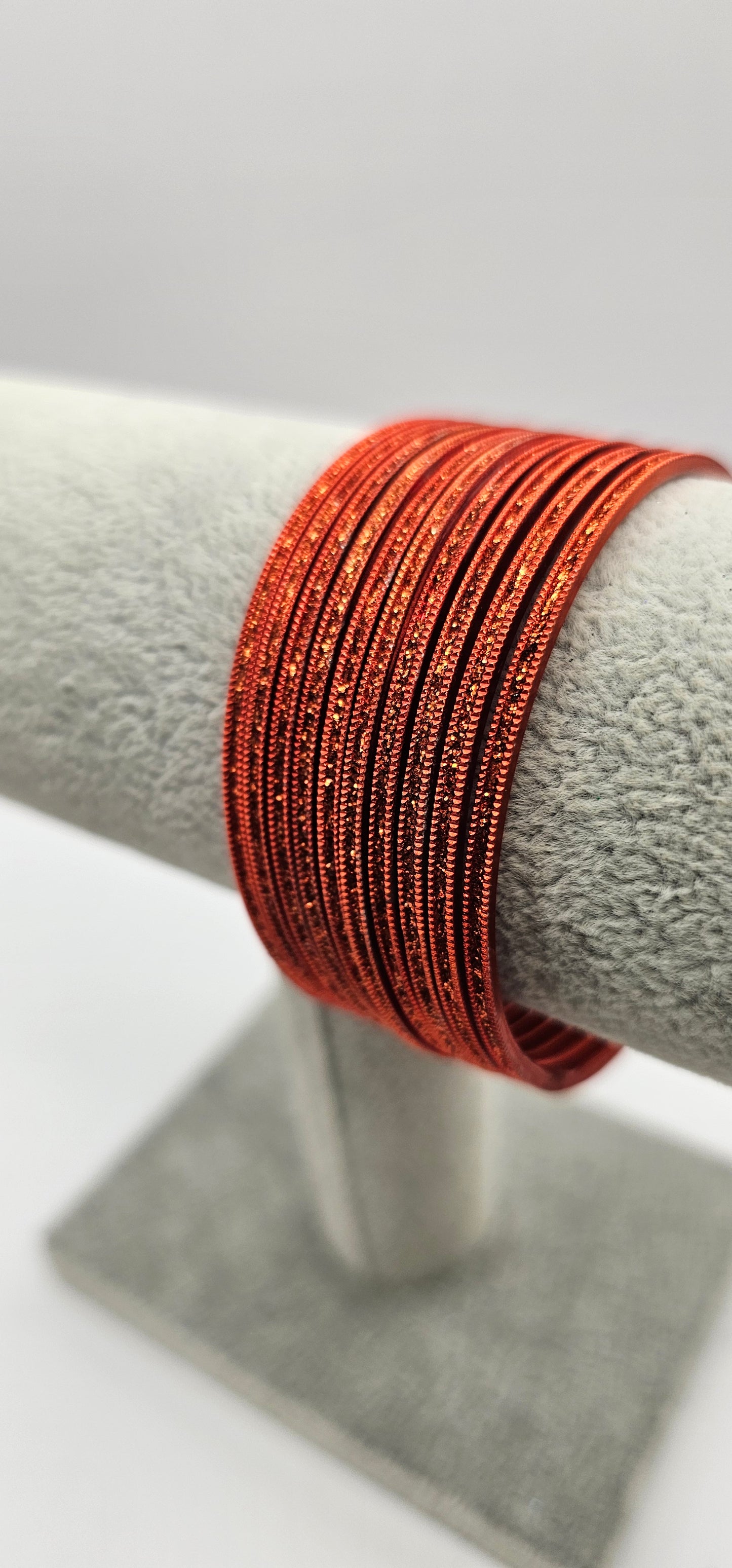 Bright Orange Sparkly Metal Bangles Size 2.4