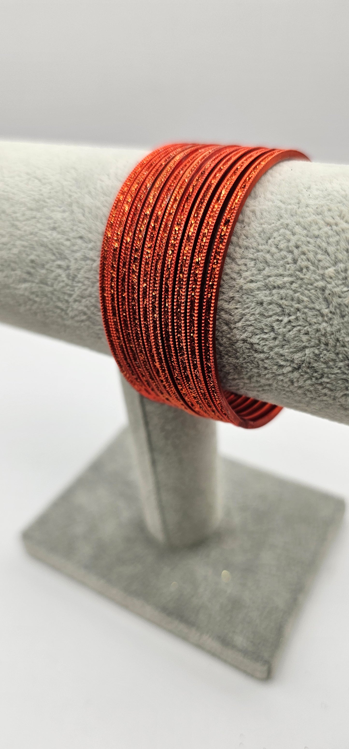 Bright Orange Sparkly Metal Bangles Size 2.4