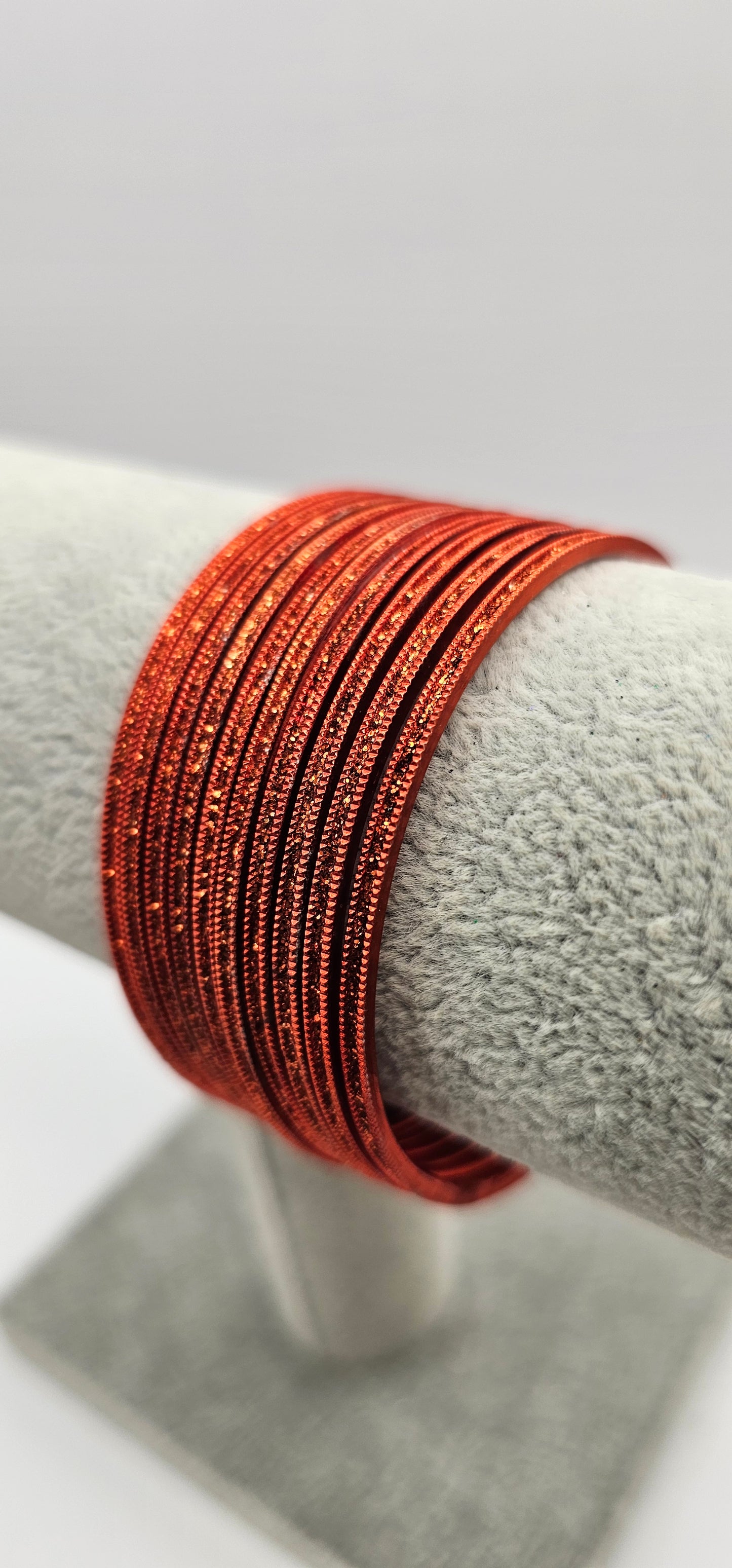 Bright Orange Sparkly Metal Bangles Size 2.4