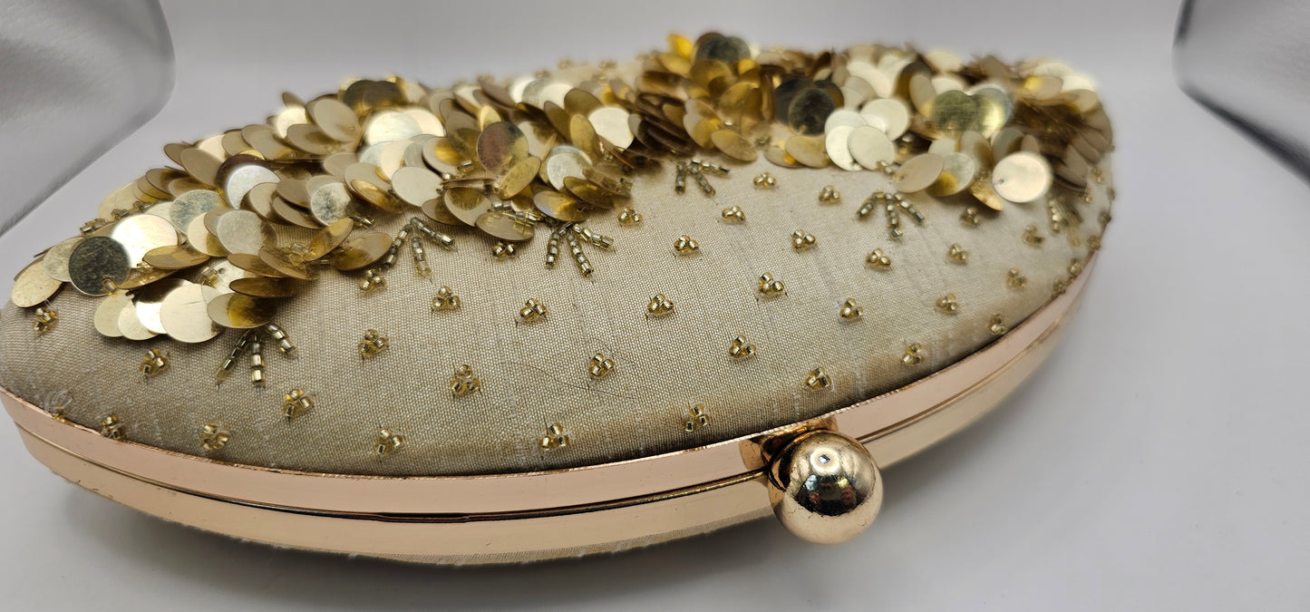 Silk Champagne Coloured Gold Rhinestones, Sequins Oval Shaped Embellished Clutch