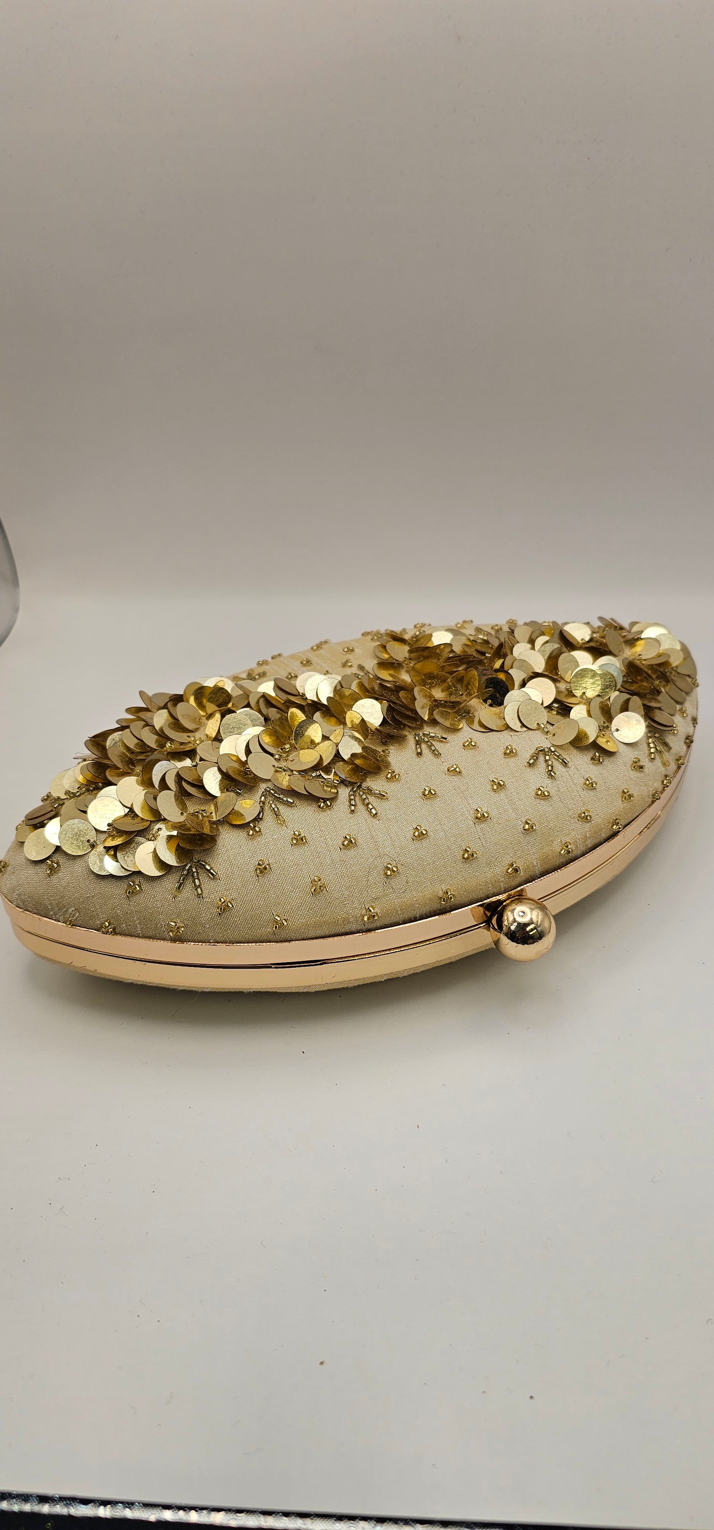 Silk Champagne Coloured Gold Rhinestones, Sequins Oval Shaped Embellished Clutch