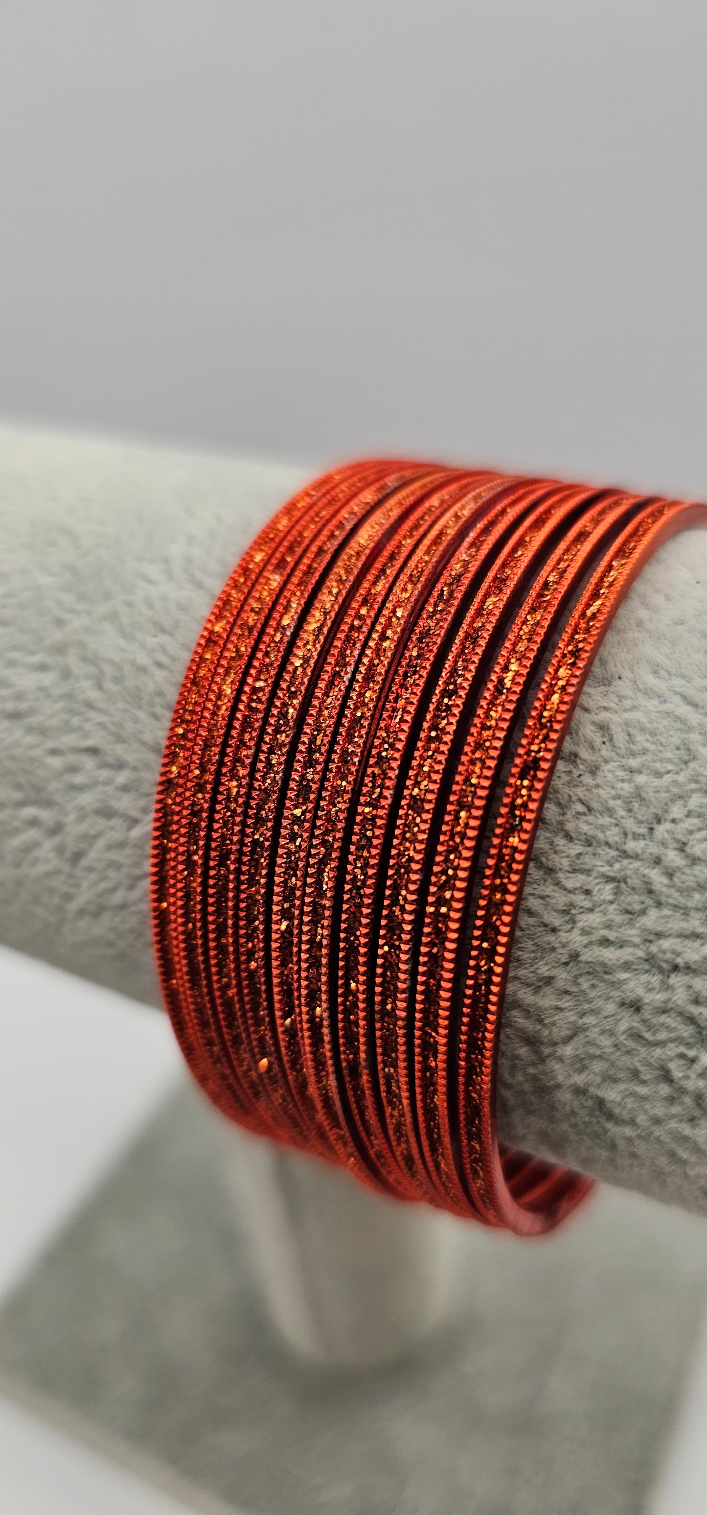 Bright Orange Sparkly Metal Bangles Size 2.4
