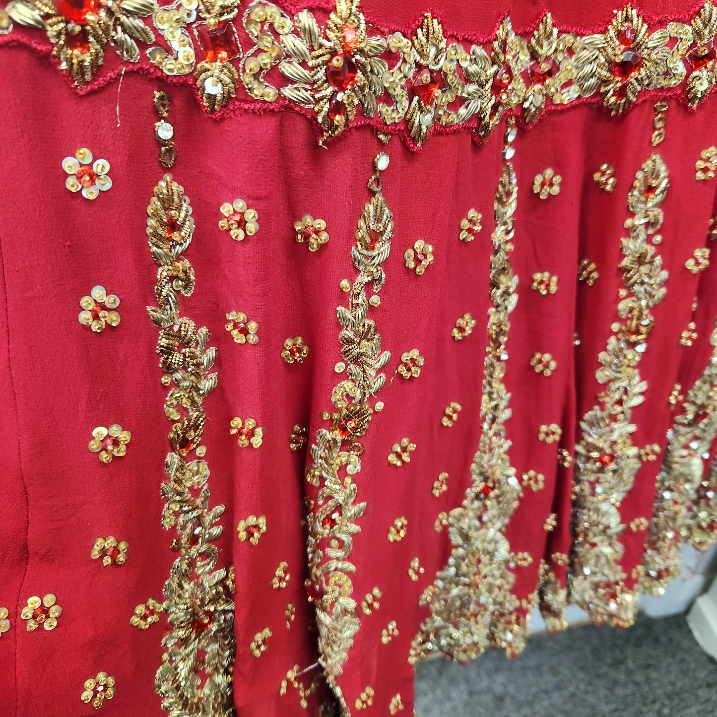 2pc bright red + red stone work and gold intricate embellishments skirt and duppatta